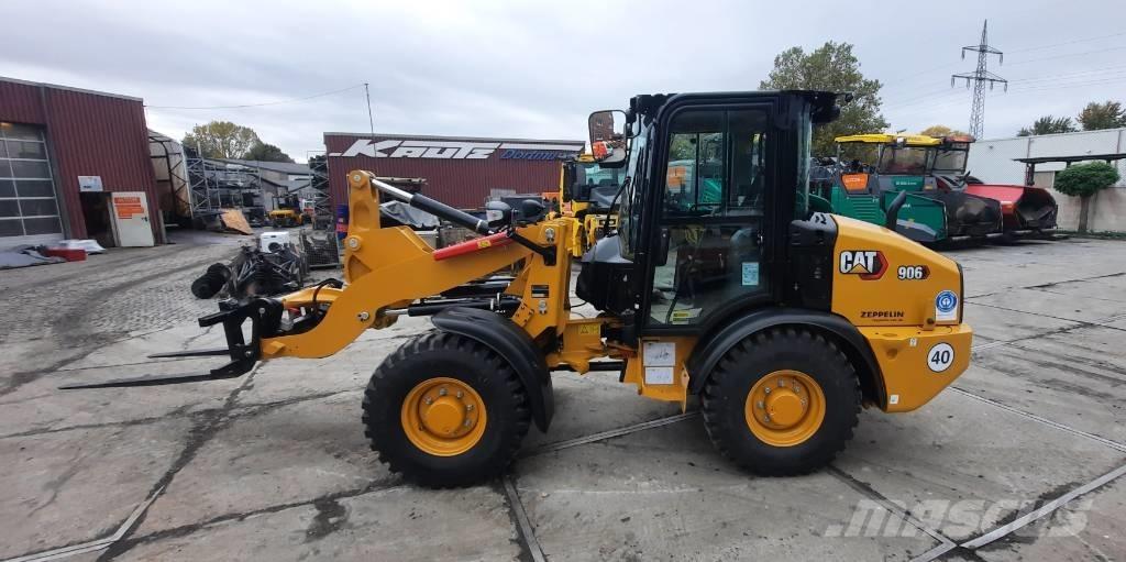 CAT 906 لوادر بعجل