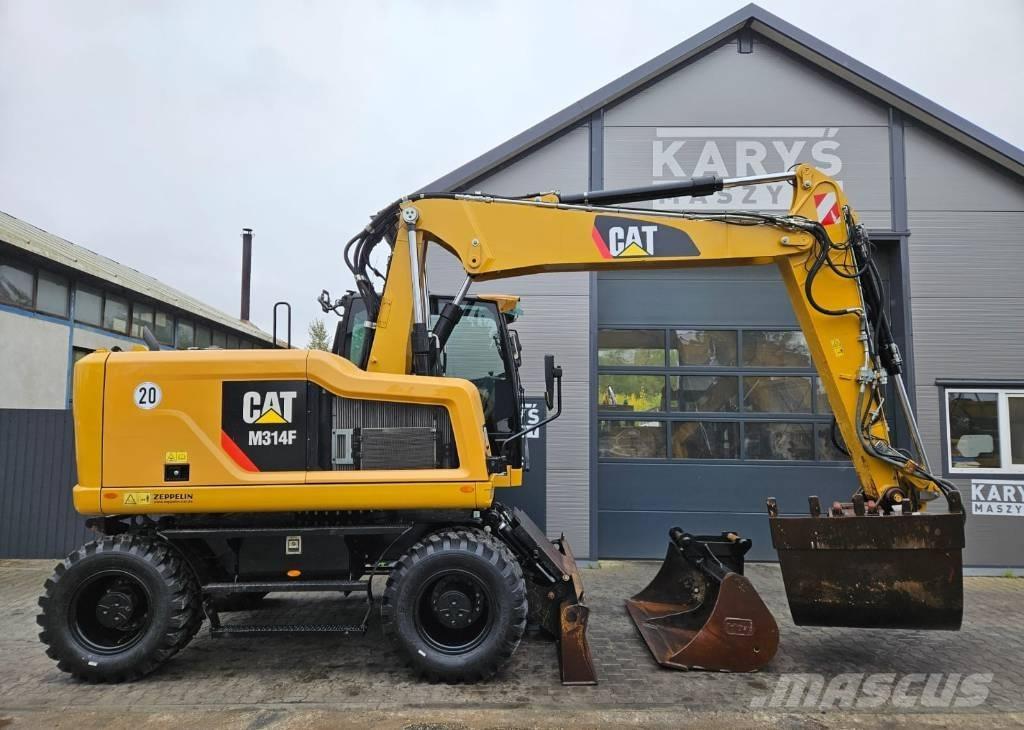 CAT M 314 حفارات بعجل