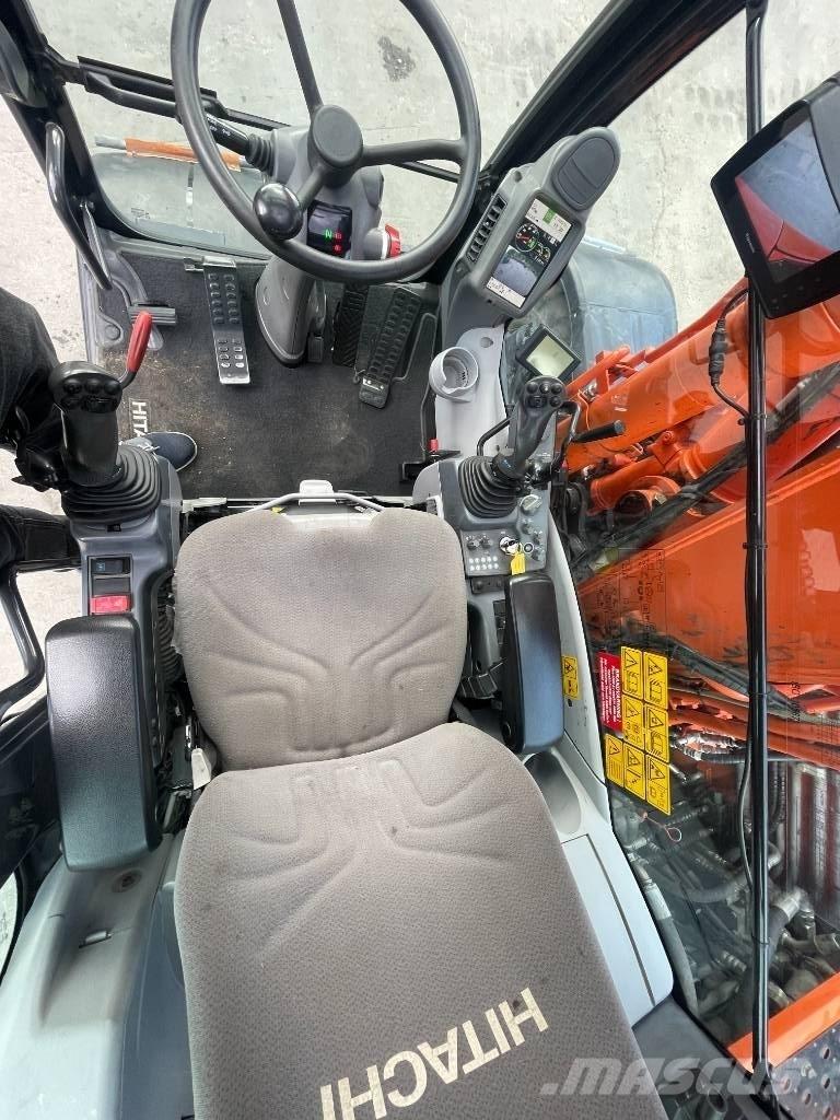 Hitachi 140W حفارات بعجل
