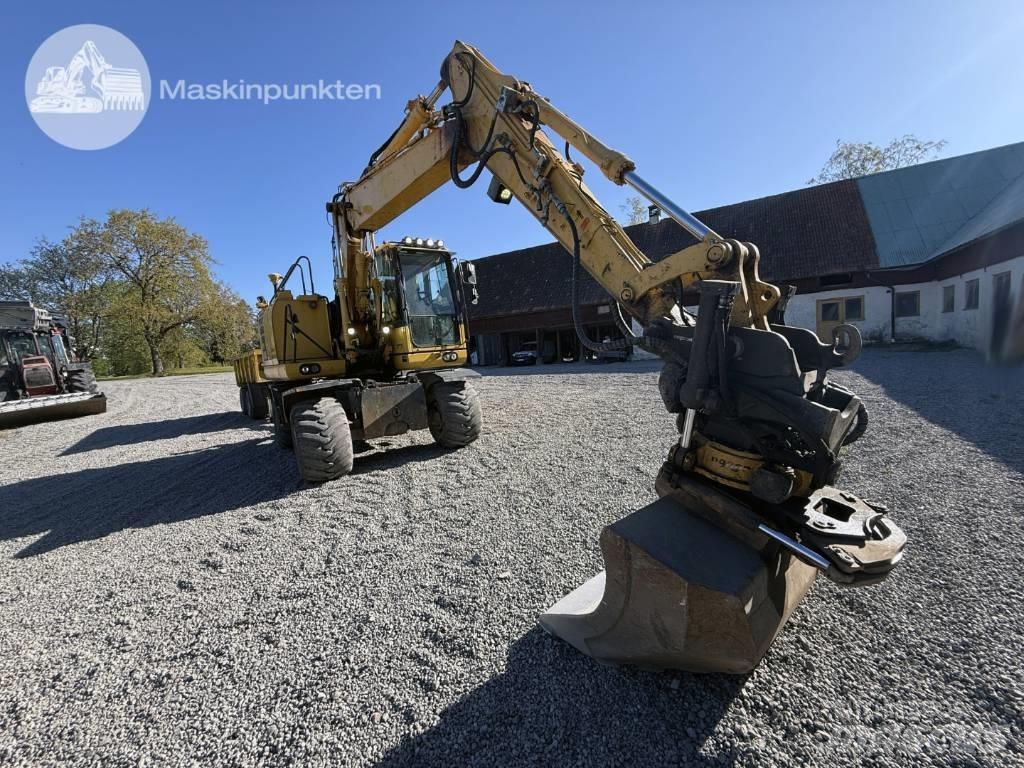 Komatsu PW 148-10 حفارات بعجل