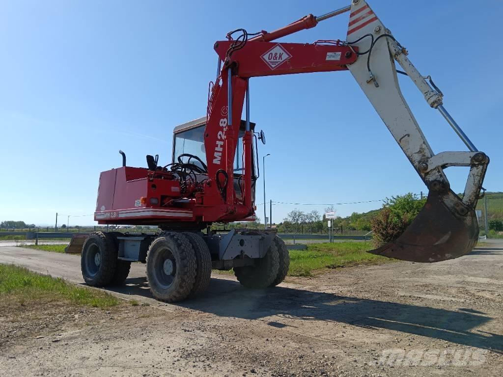 O&K MH2,8C حفارات بعجل