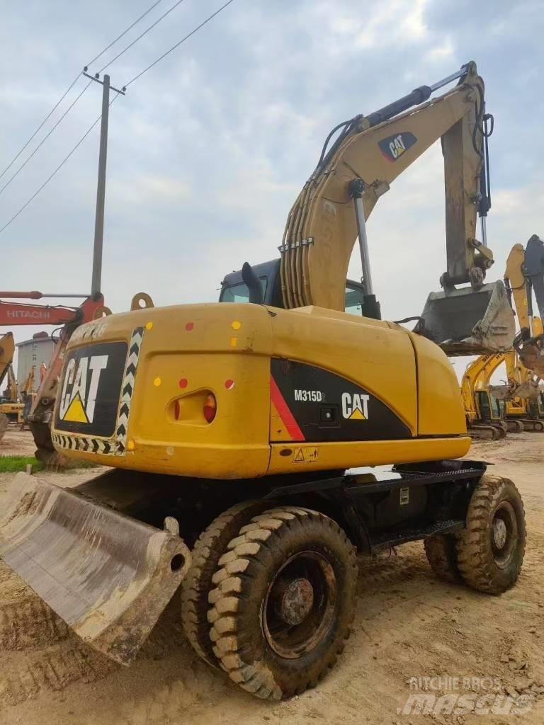 CAT M315D2 حفارات زحافة
