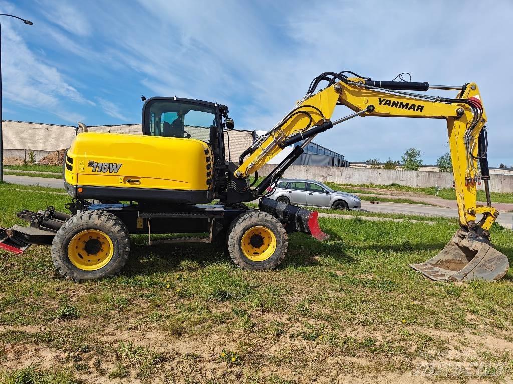 Yanmar B110W حفارات بعجل