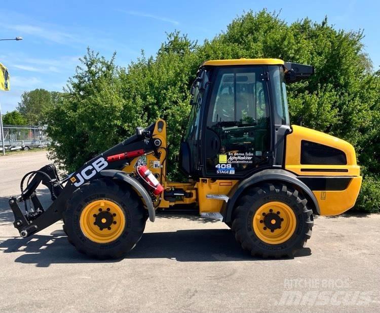 JCB 409 لوادر بعجل