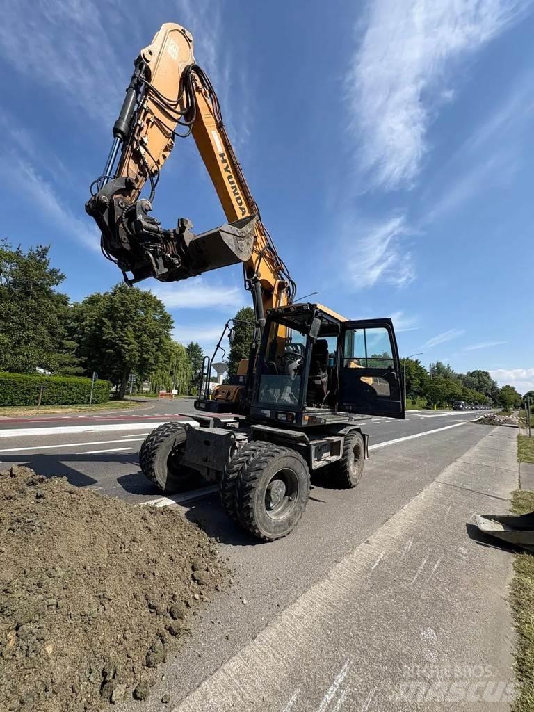 Hyundai HW140 حفارات بعجل