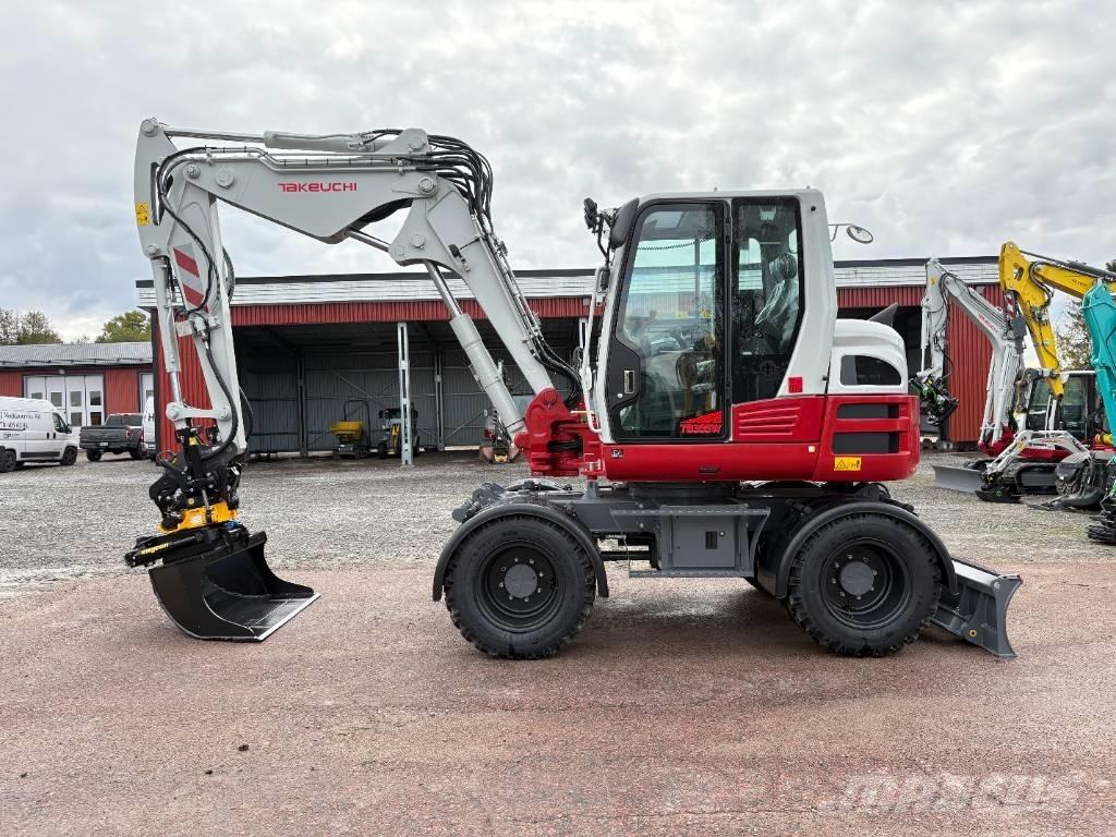 Takeuchi TB395W حفارات بعجل