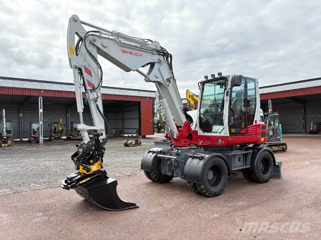Takeuchi TB395W حفارات بعجل