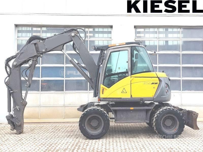 Mecalac 714 MW حفارات بعجل