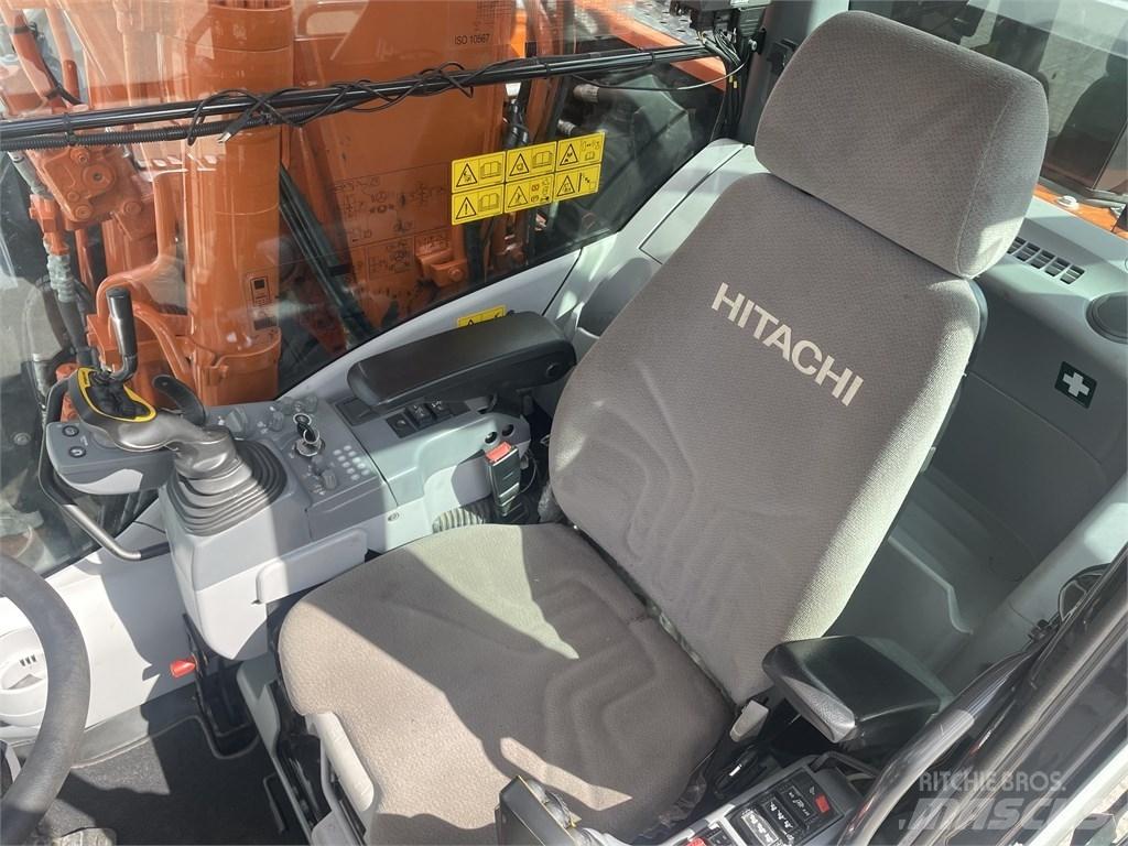 Hitachi ZX 140 W-6 حفارات بعجل