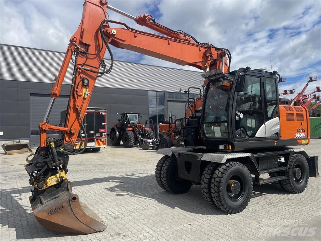 Hitachi ZX 140 W-6 حفارات بعجل
