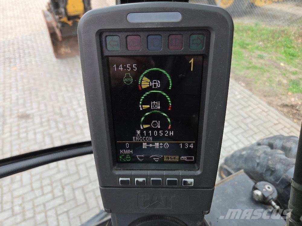 CAT M313D حفارات بعجل
