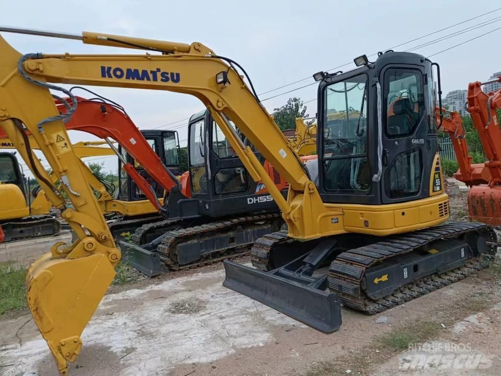 Komatsu PC 55 MR حفارات زحافة