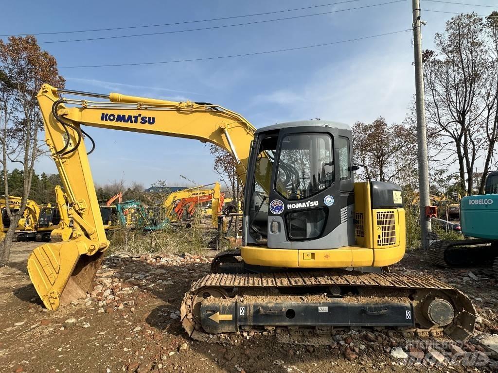 Komatsu PC 128 US حفارات زحافة