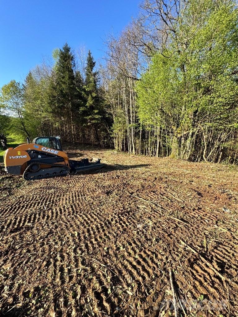 CASE TV 370 B لوادر انزلاقية التوجيه