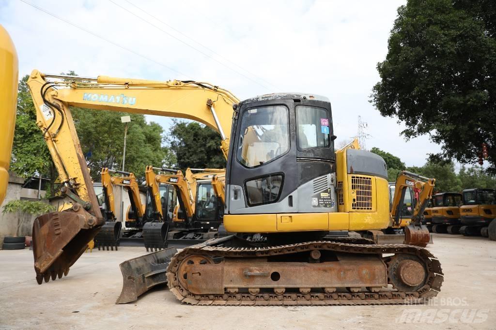 Komatsu PC 128 US حفارات وسط 7 طن - 12 طن