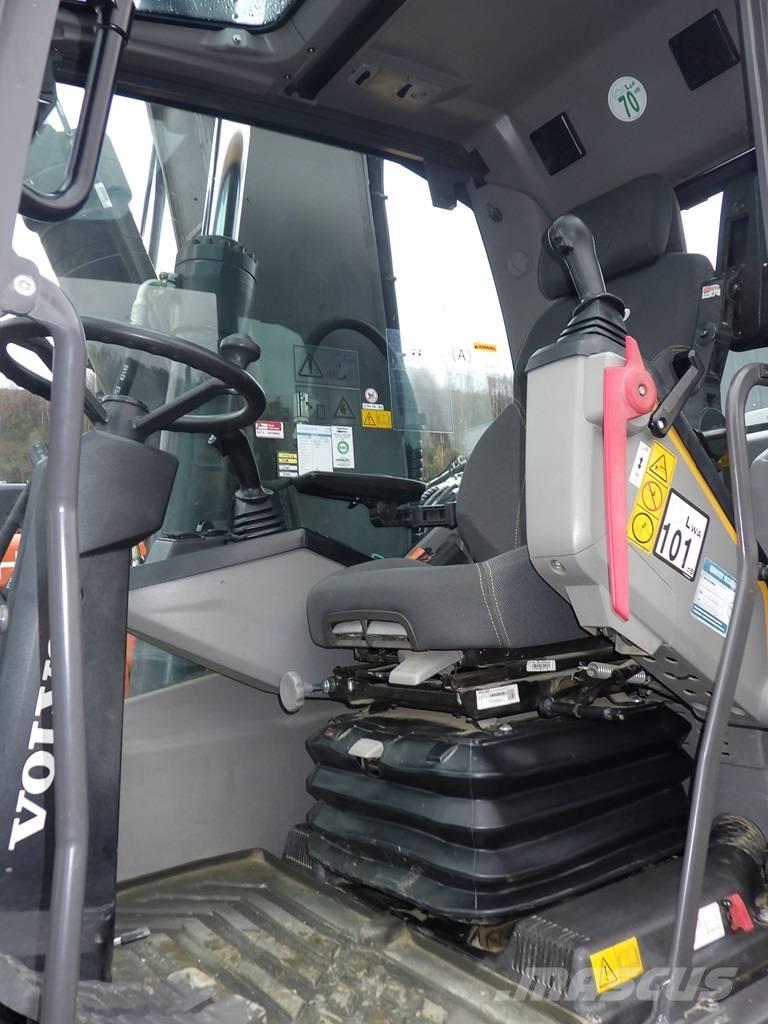 Volvo EW 180 E حفارات بعجل