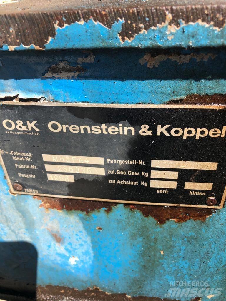 O&K MH6 FA4 حفارات بعجل