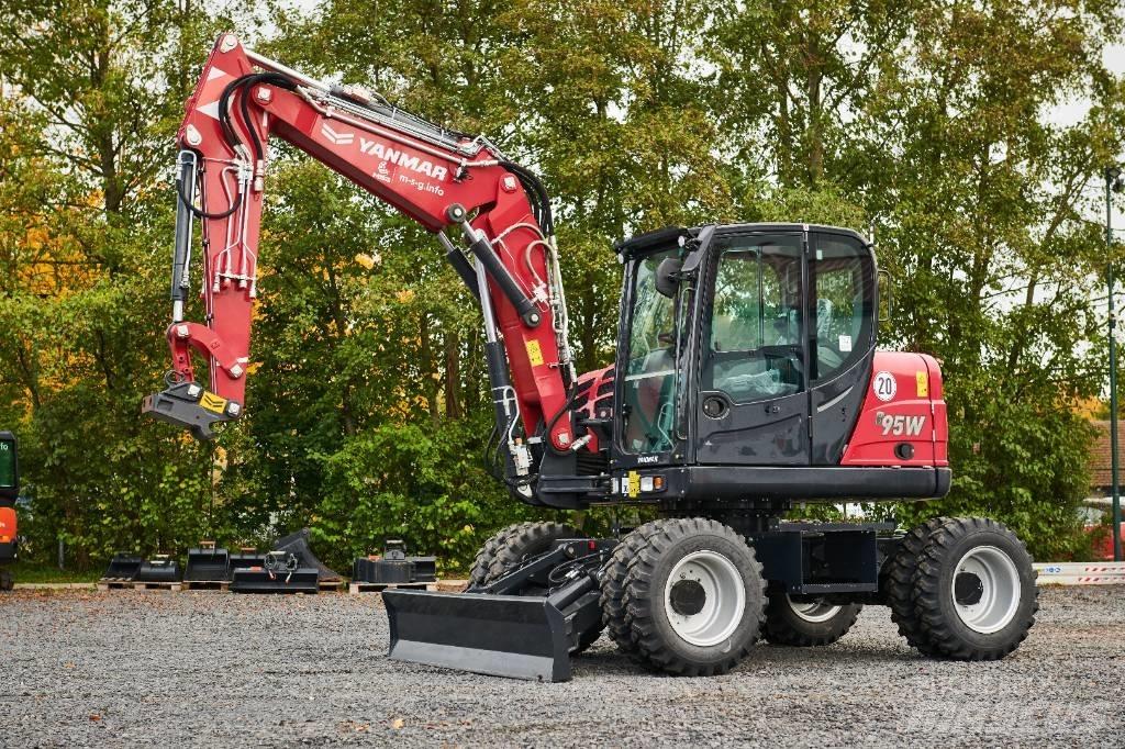 Yanmar B95W حفارات بعجل