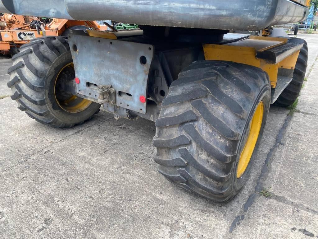 Volvo EW 140 C حفارات بعجل