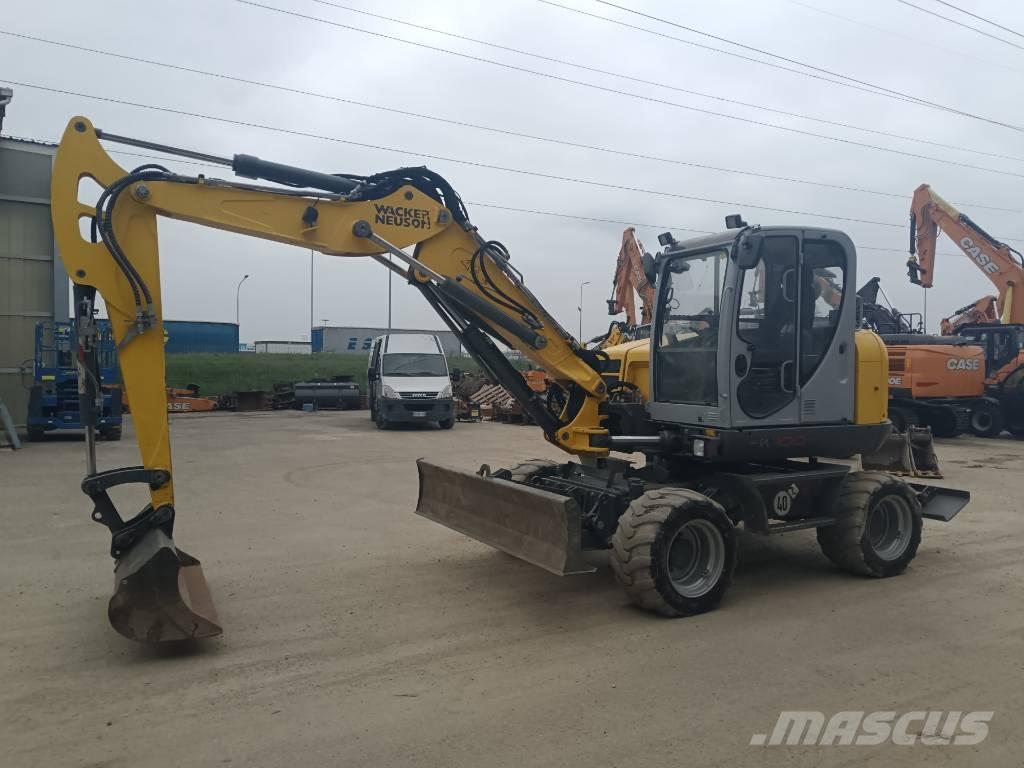 Wacker Neuson EW 100 حفارات بعجل