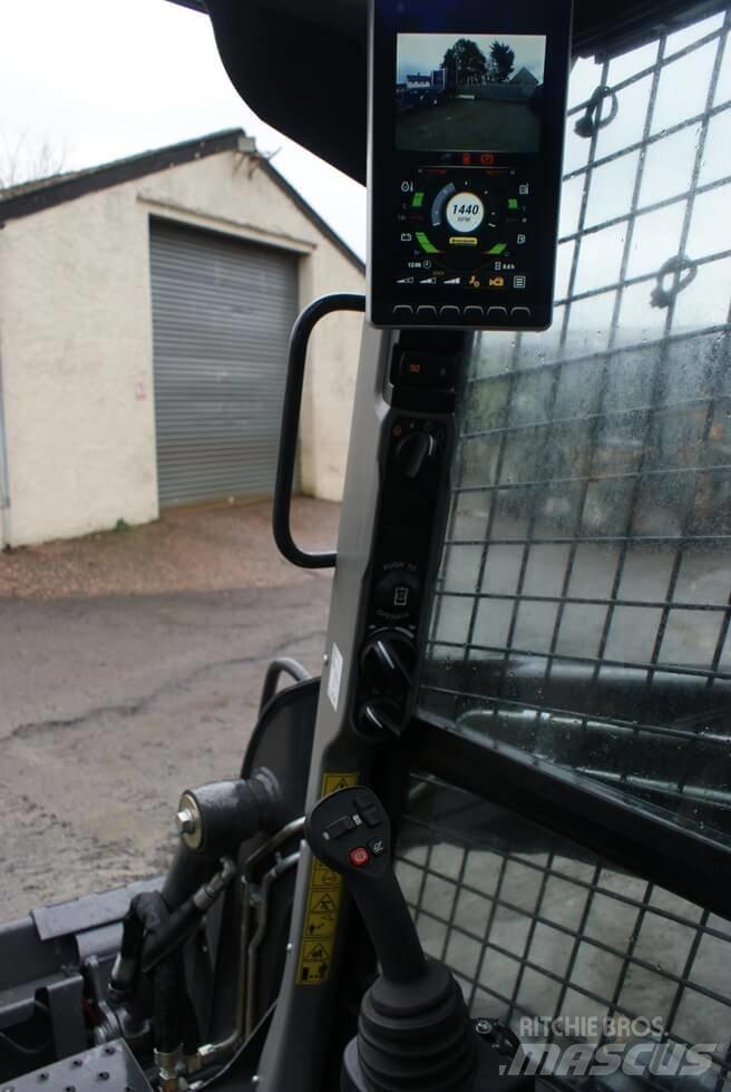 New Holland L 318 لوادر صغيرة