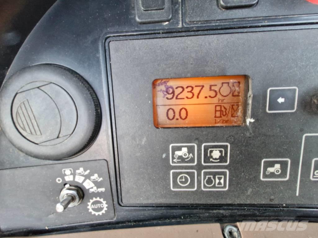 John Deere 7730 الجرارات