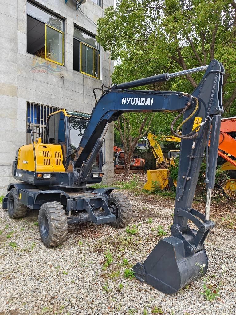 Hyundai R 60W حفارات بعجل