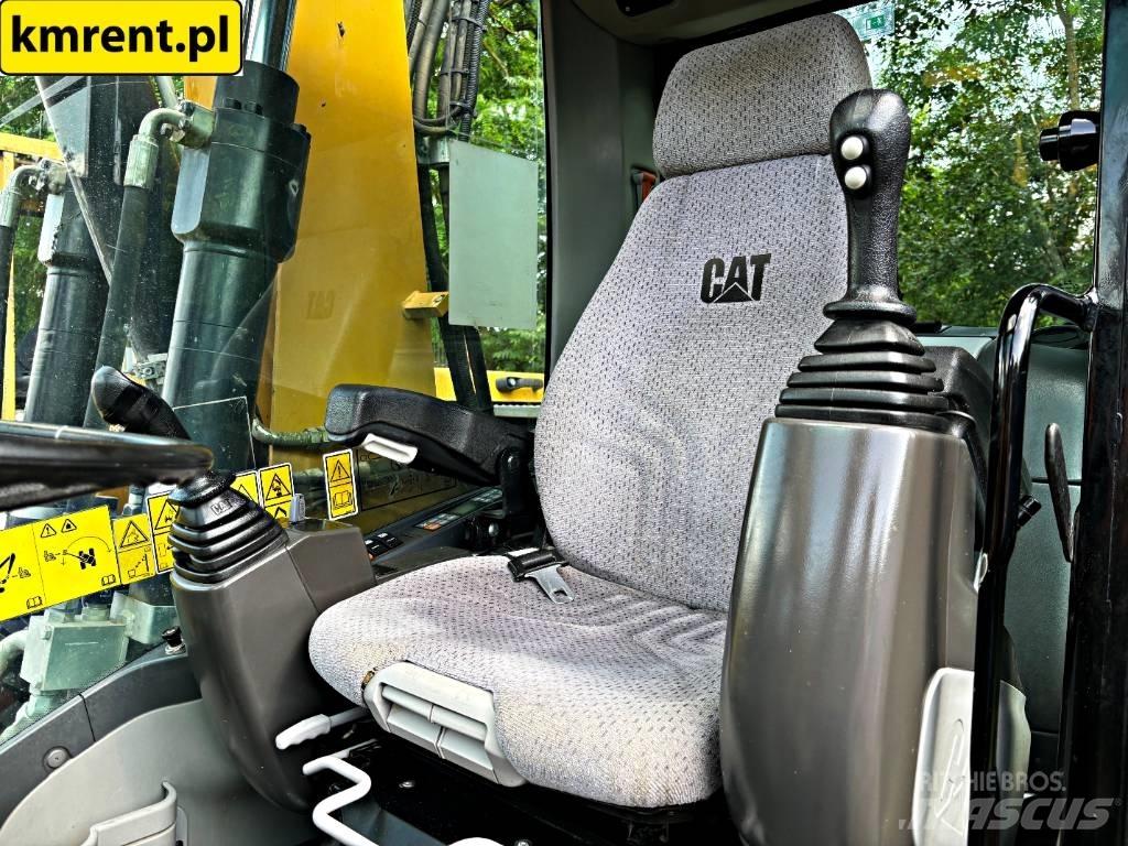 CAT M 313 D حفارات بعجل