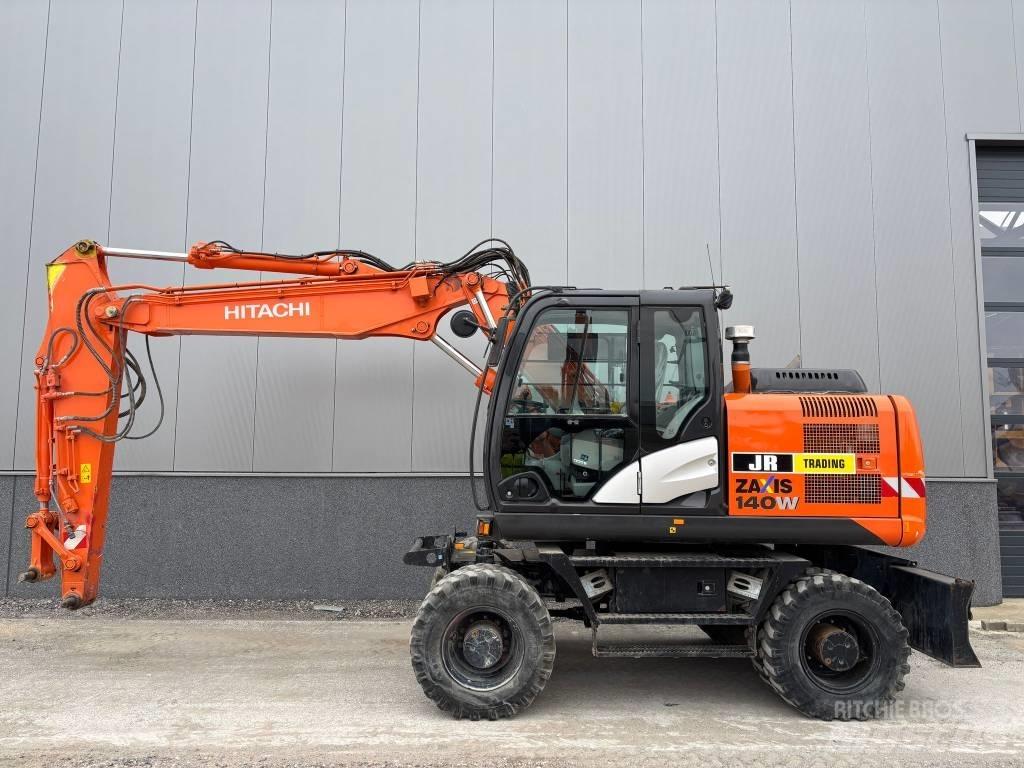 Hitachi ZX 140 W-5B حفارات بعجل