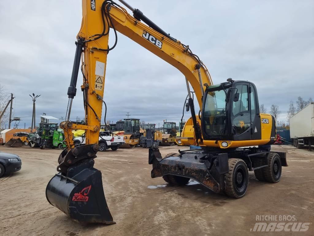 JCB JS 145 W حفارات بعجل