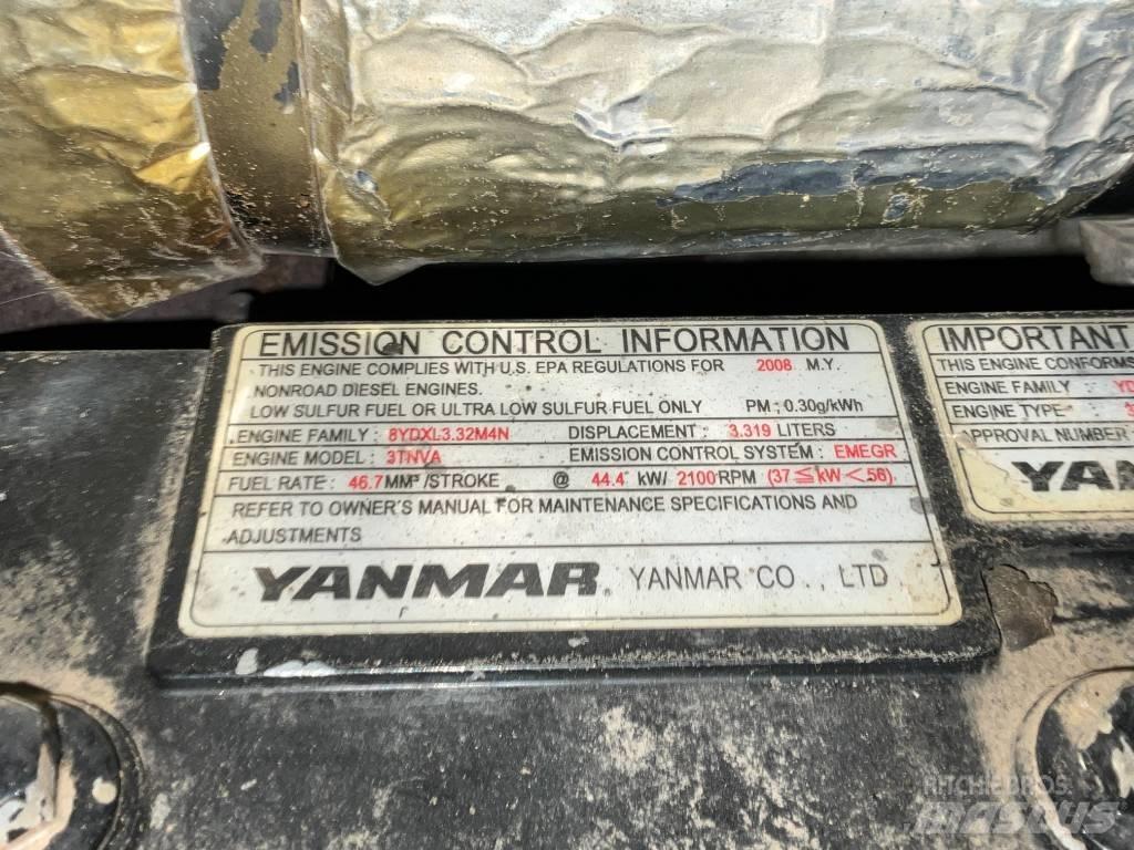 Neuson 6503 WD حفارات بعجل