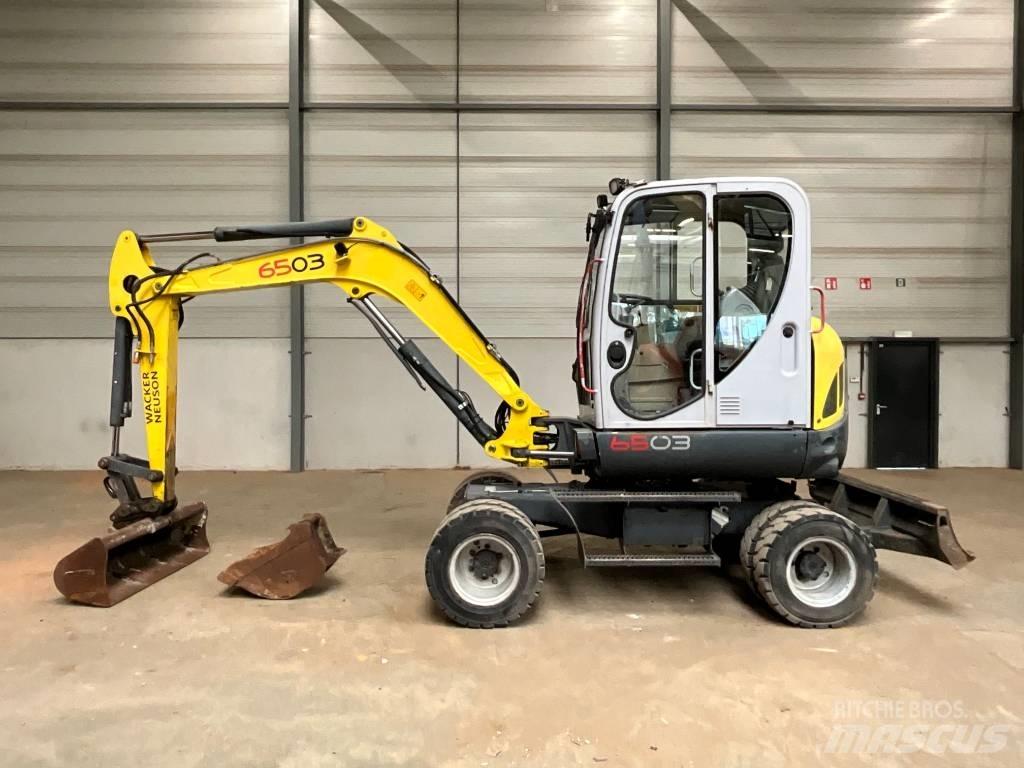 Neuson 6503 WD حفارات بعجل