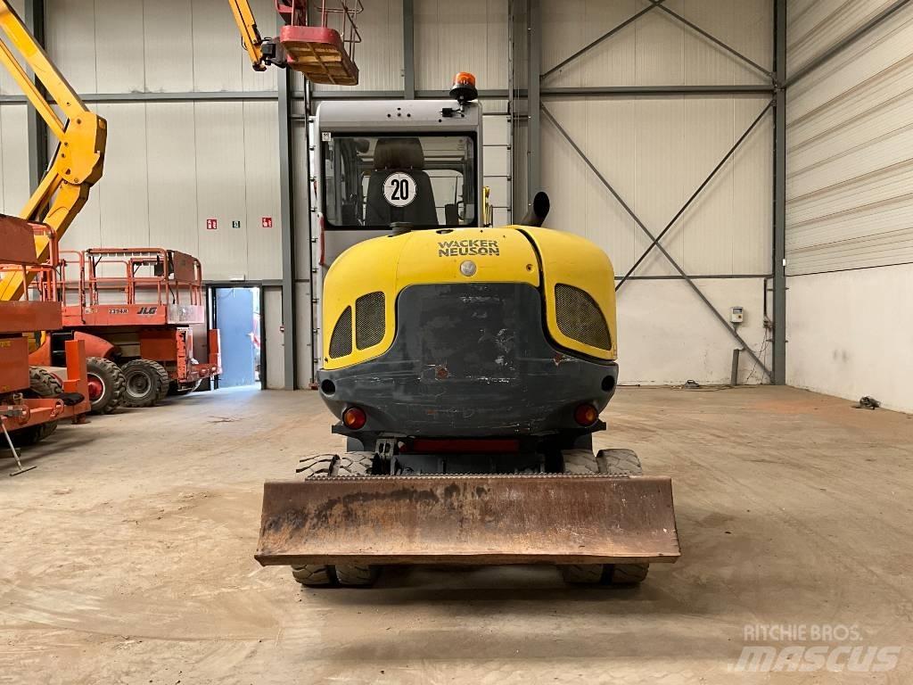 Neuson 6503 WD حفارات بعجل