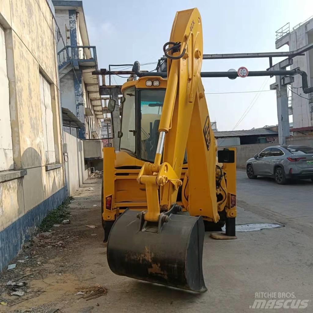 JCB 4CX لوادر ذات جرافات عكسية