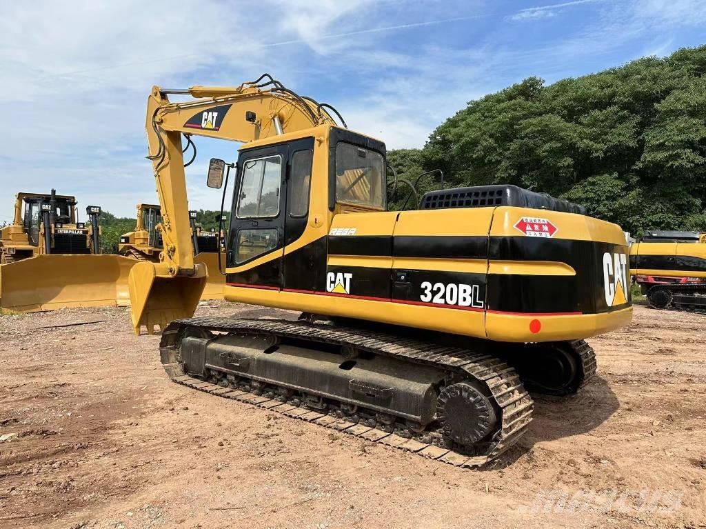 CAT 320 B L حفارات زحافة