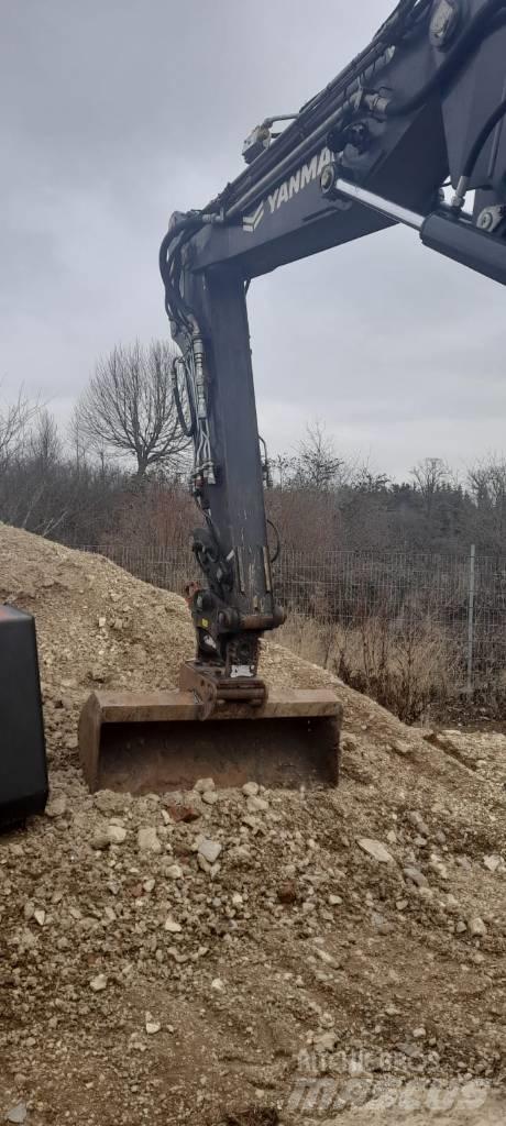 Yanmar B 110 W حفارات بعجل
