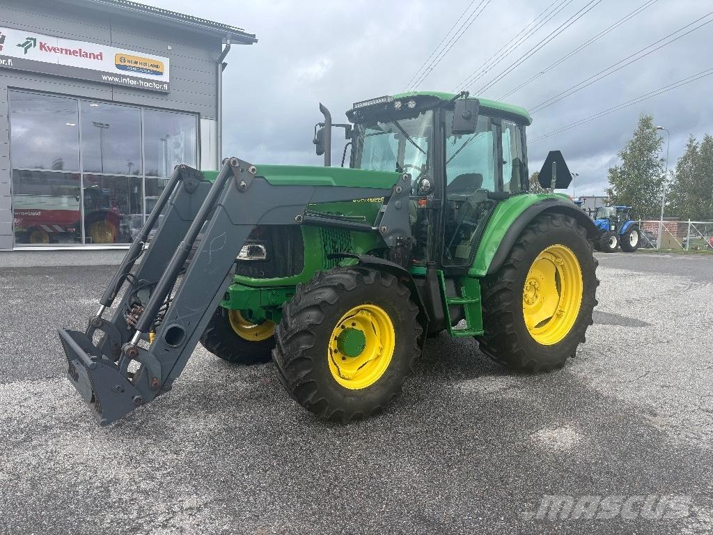 John Deere 6320 SE الجرارات