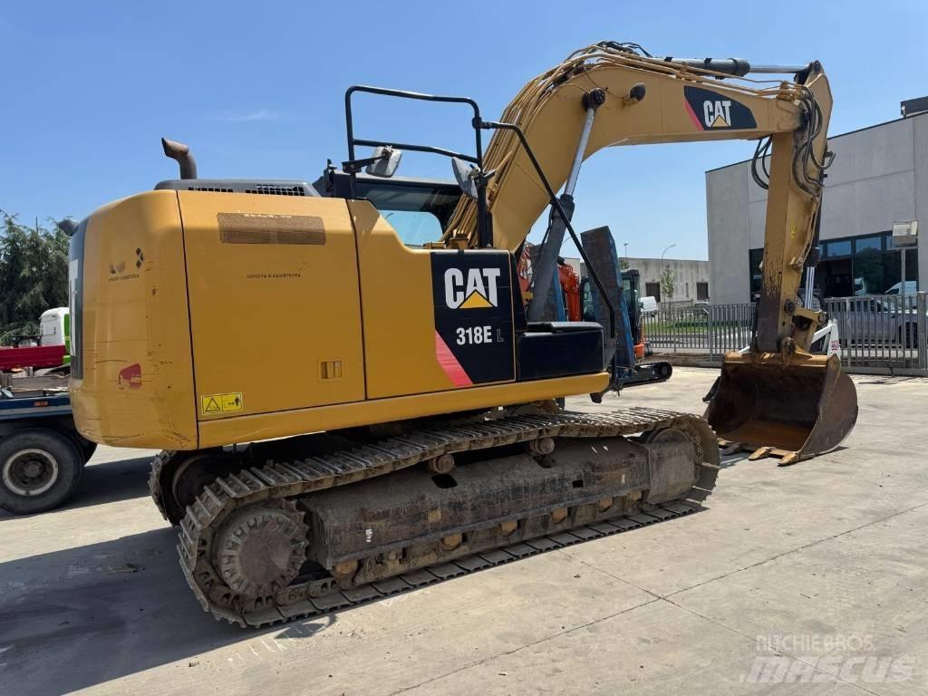 CAT 318E حفارات زحافة