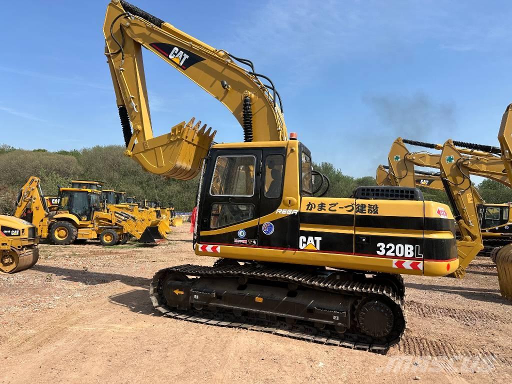CAT 320 B حفارات زحافة