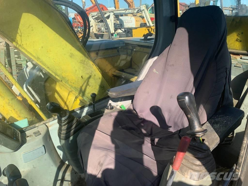 New Holland E 135 SR حفارات زحافة