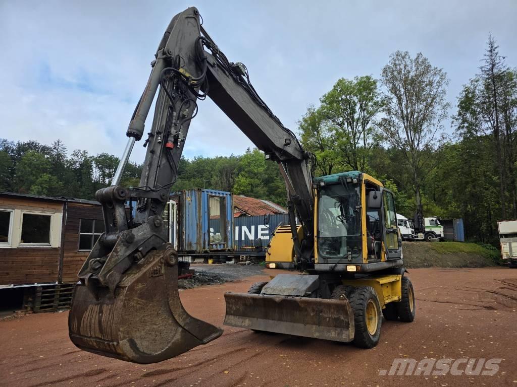 Volvo EW 140 B حفارات بعجل