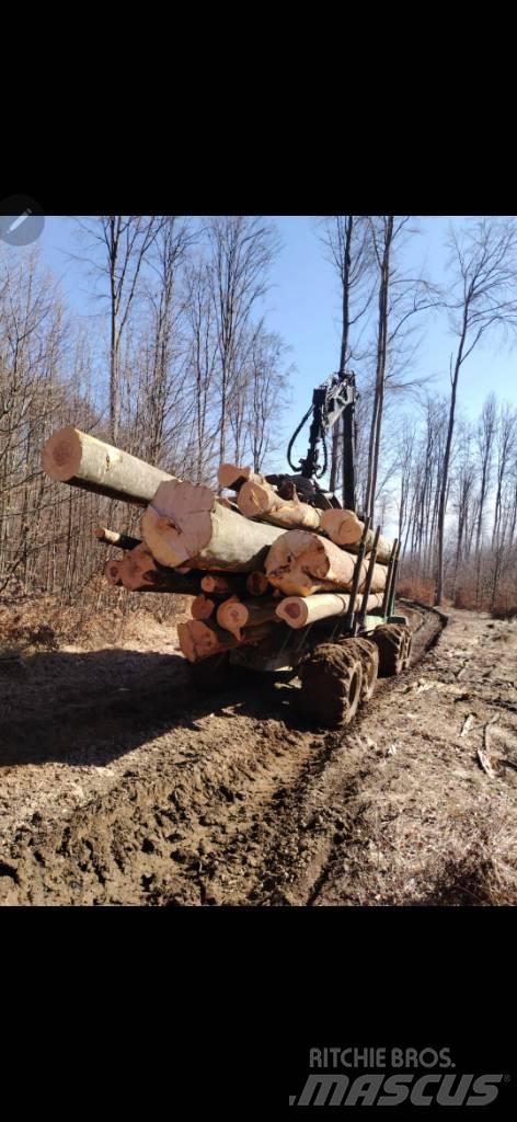 John Deere 1110 شاحنات