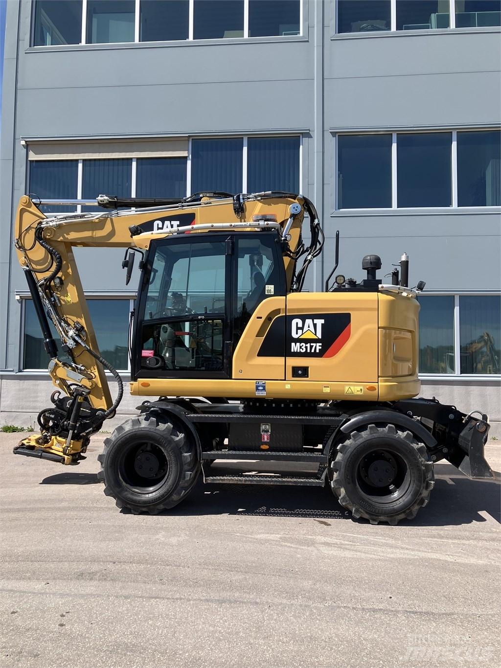 CAT 317 F حفارات بعجل
