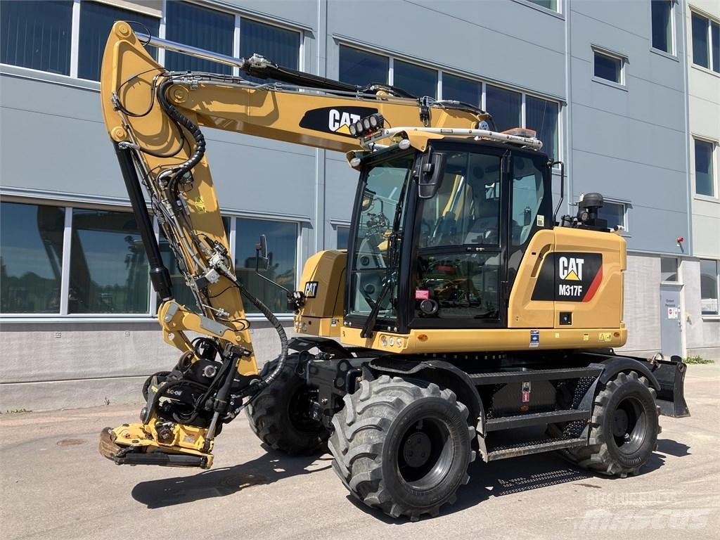 CAT 317 F حفارات بعجل