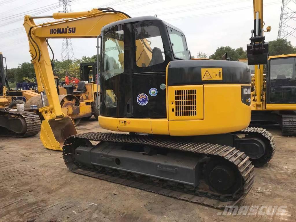 Komatsu PC 128 US حفارات وسط 7 طن - 12 طن
