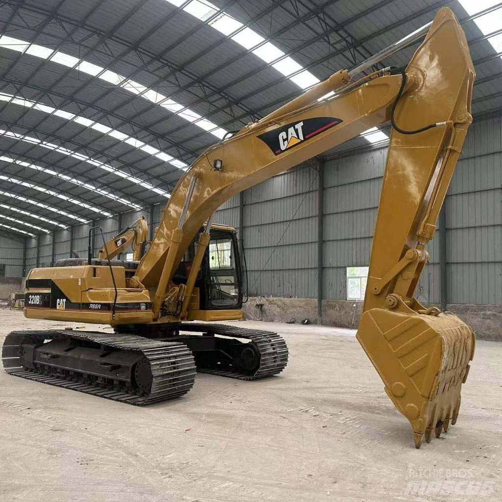 CAT 320 B حفارات زحافة