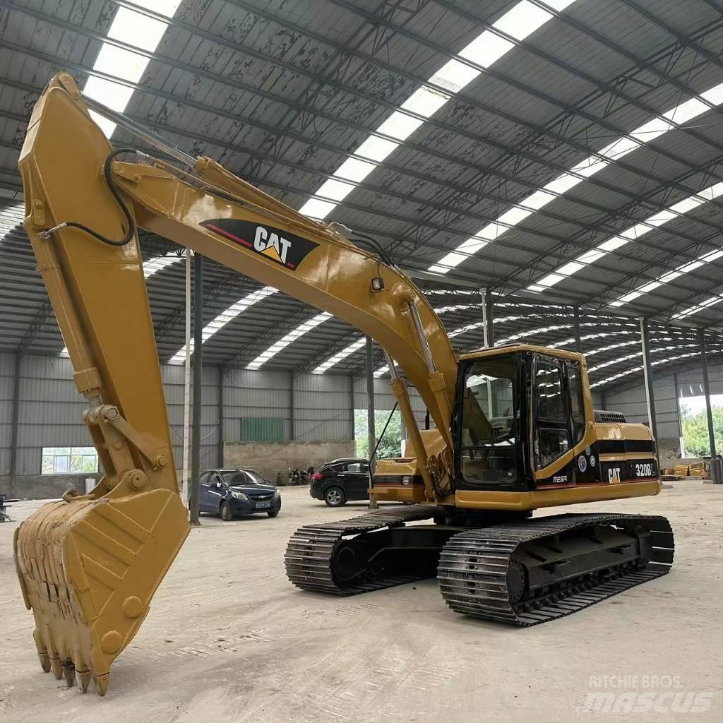 CAT 320 B حفارات زحافة