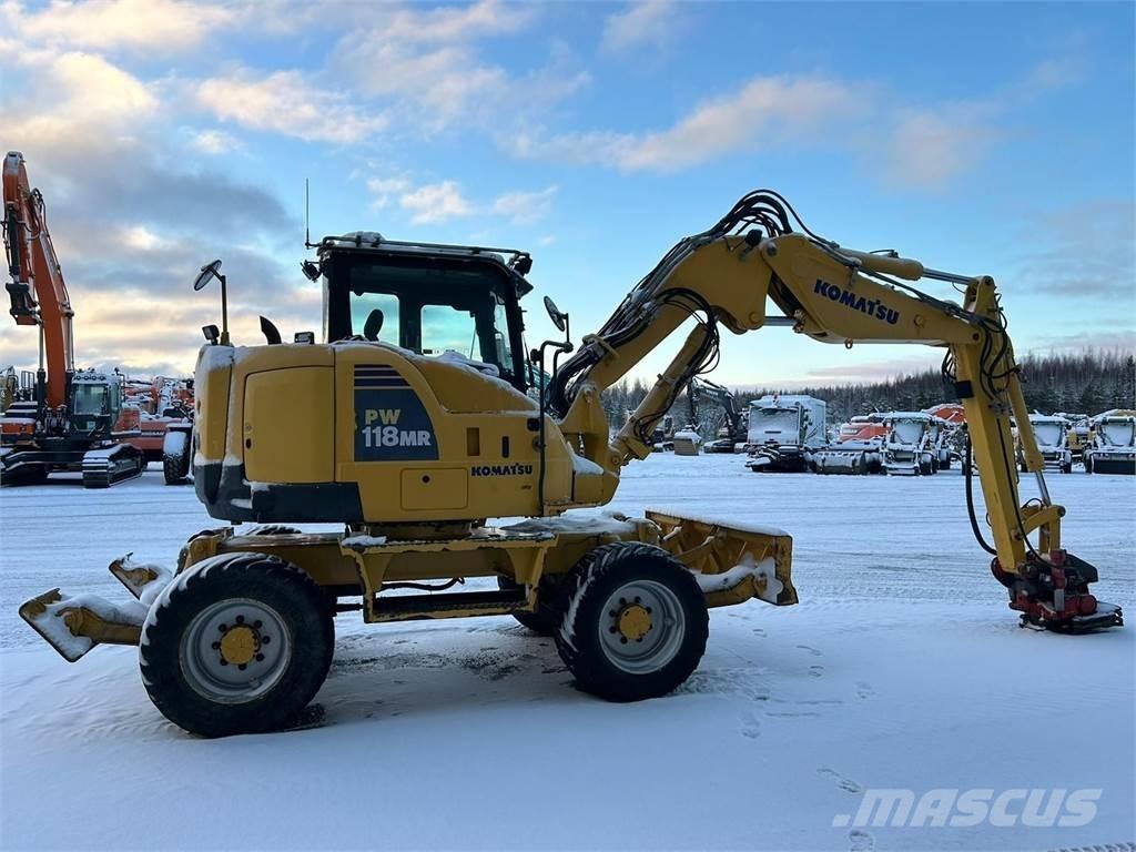 Komatsu PW118MR-8 حفارات بعجل
