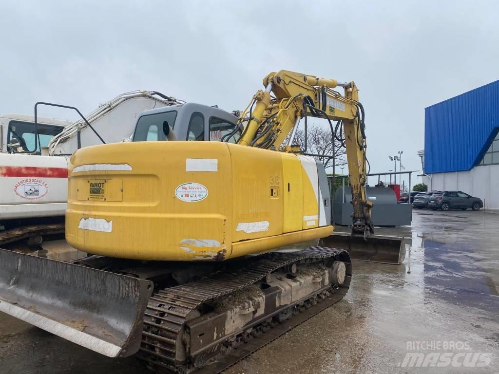 New Holland E 145 حفارات زحافة