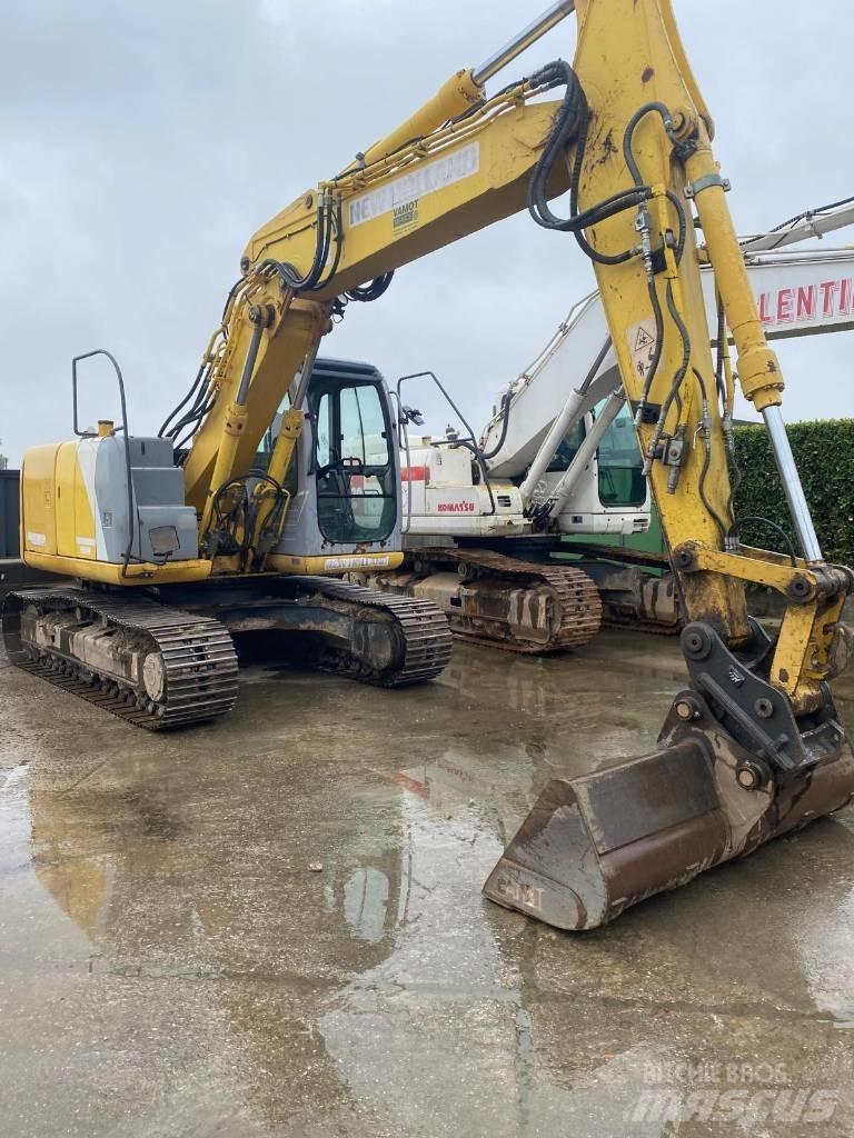 New Holland E 145 حفارات زحافة